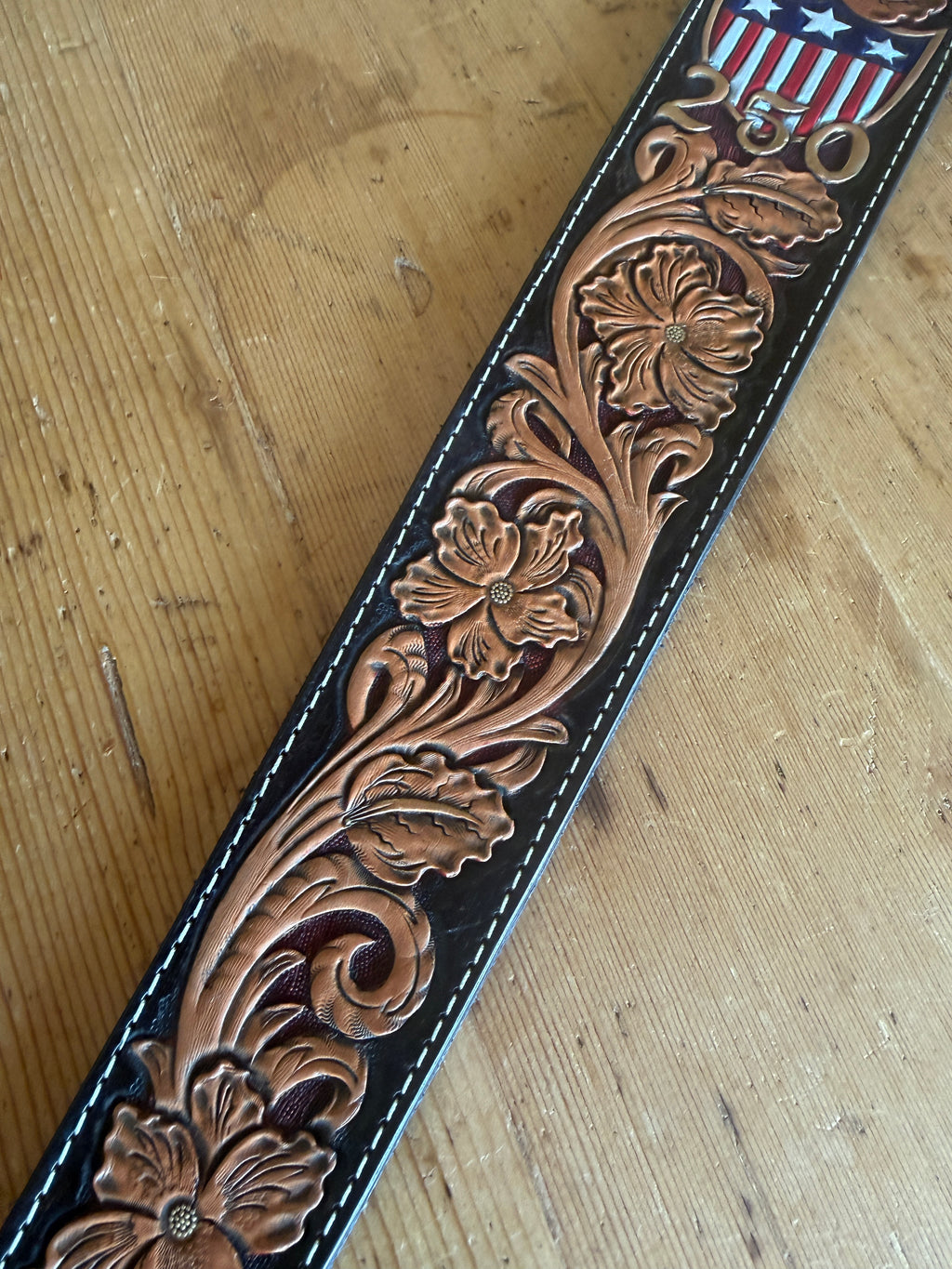 America 250 Rifle Sling - hand-tooled floral leather with American flag detail